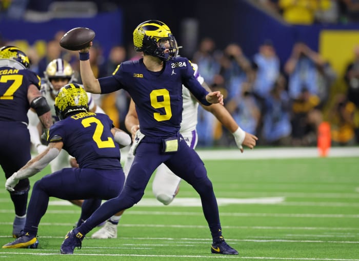 Jan 8, 2024; Houston, TX, USA; Michigan Wolverines quarterback J.J. McCarthy (9) passes the ball against the Washington Huskies during the third quarter in the 2024 College Football Playoff national championship game at NRG Stadium.